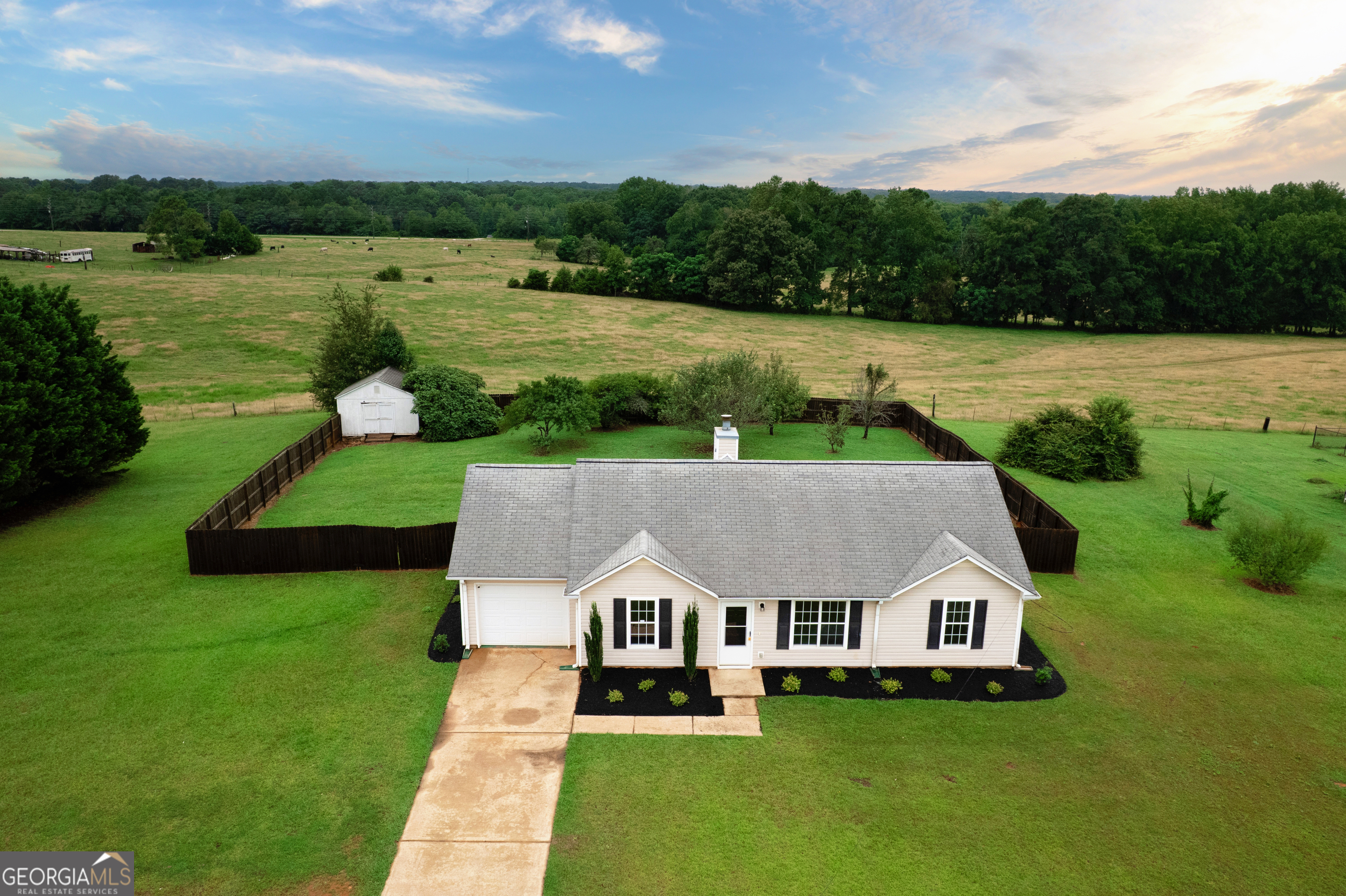 This beautifully maintained 3-bedroom, 2-bath home offers charm, comfort, and convenience all in one. Located in the heart of Locust Grove, this gem sits on a quiet street with easy access to shopping, schools, and I-75 for commuters. Step inside to find a spacious and open floor plan with updated flooring, plenty of natural light, and a cozy living area. The kitchen offers ample cabinet space and a dining area perfect for family meals or entertaining. The primary suite features a private bath and generous closet space, while the secondary bedrooms are great for guests, kids, or a home office. Enjoy morning coffee or unwind with a book on the screened-in back porch, overlooking your fenced-in backyard-perfect for pets, playtime, or weekend gatherings. Plus, a new HVAC system adds extra peace of mind. Move-in ready and full of potential, 113 Carols Lane is ready to welcome you home. Schedule your private showing today!