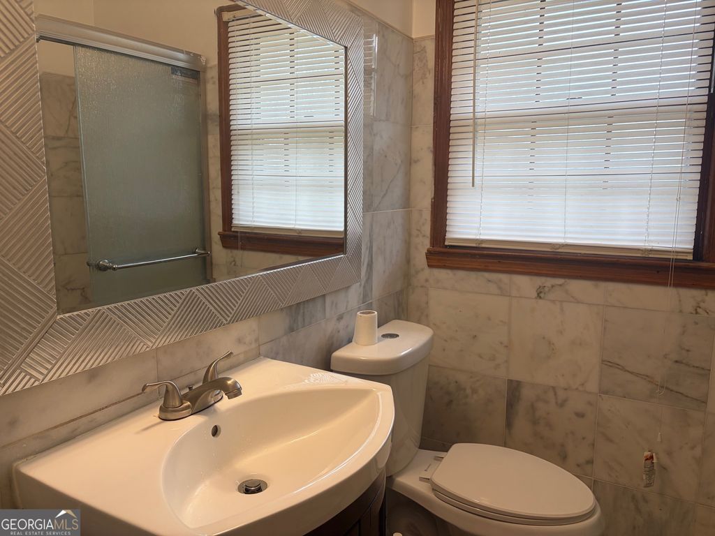 Photo of 1764 Lake Harbin Road, Morrow, GA 30260 (MLS # 10654396)