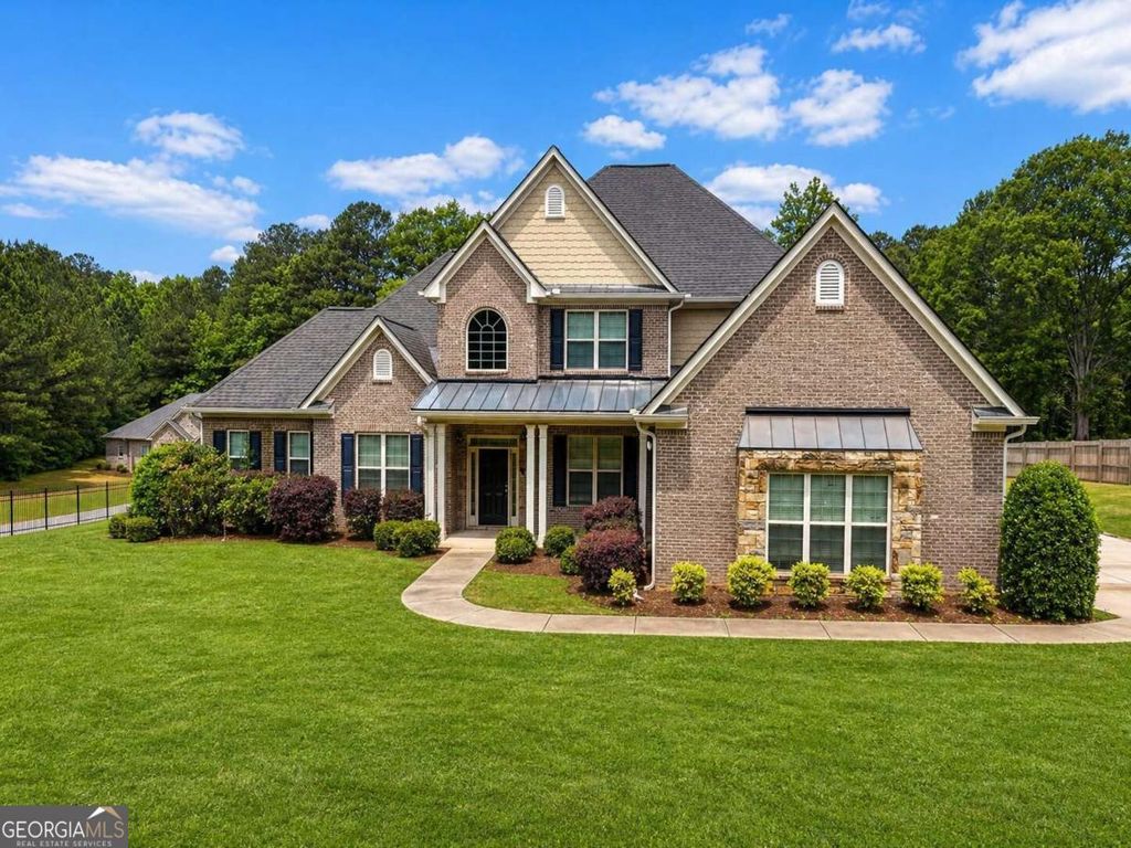Photo of 125 Trustin Lake Drive, Fayetteville, GA 30214 (MLS # 10742986)