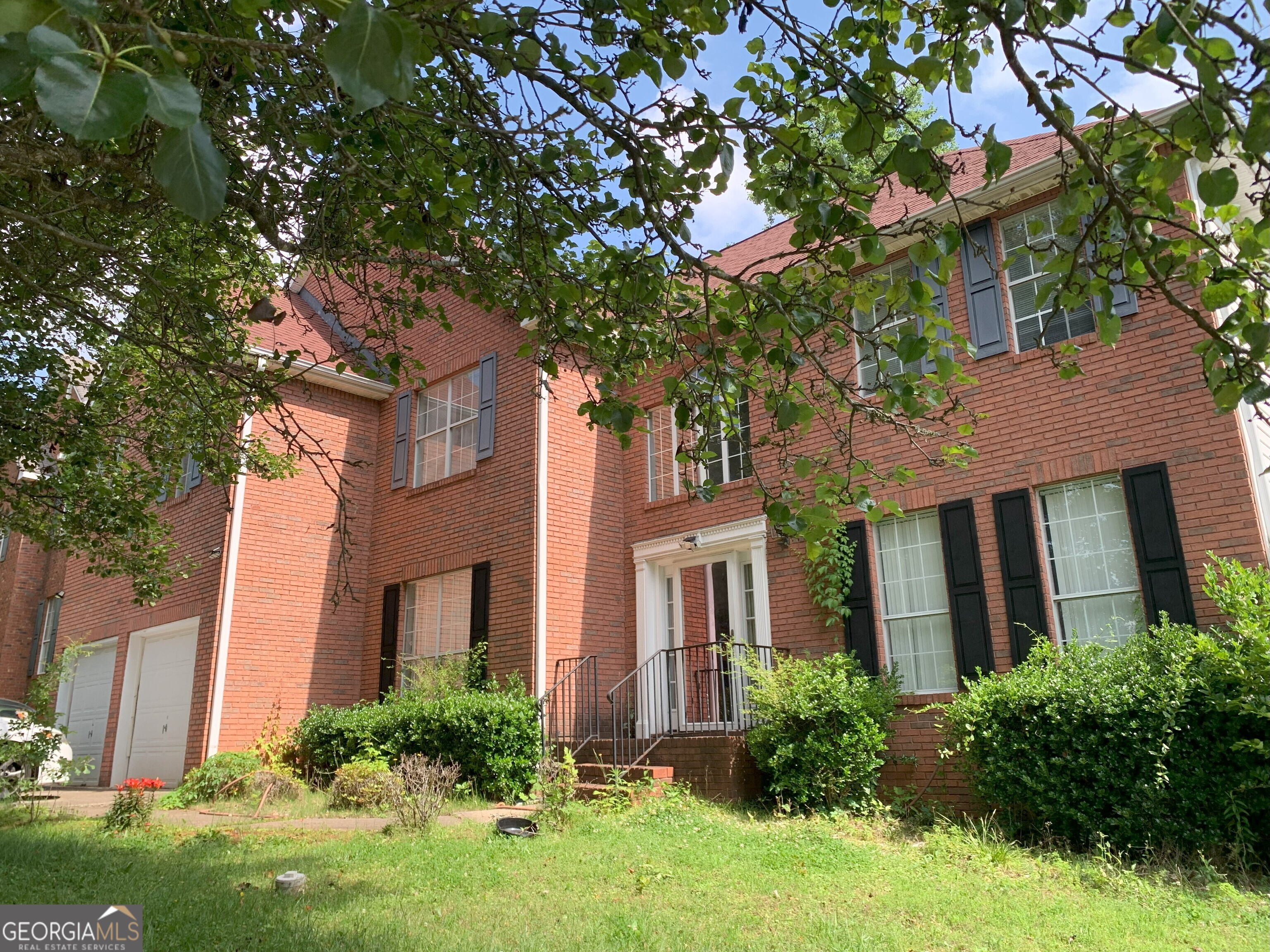 **Showings Start 6/20/2025**Large 8-Bedroom, High Ceiling Home in Quiet Neighborhood in Stone Mountain. Very large floorplan. Full bedroom on the main level with access to full bathroom. High Ceilings in Family Room with Fireplace. Open floor plan with large kitchen-Separate Dining room and separate formal sitting room. Catwalk Stairs overlooking high ceiling family room. Upstairs are 4 bedrooms which includes an extremely large master bedroom suite and spacious master bathroom and oversized master closet. Finished basement with 3 bedrooms with kitchen and full bathroom. Back Deck and Fenced Backyard. Perfect for a large or multi-generational family. **NO HOA*** Home needs TLC. Seller motivated. Being Sold "AS-IS". Lease Purchase Program. With Preferred Lender - FREE Appraisal for any loan program. Up to $2,500 in closing costs and up to $15,000 in Closing Costs/Down Payment Assistance & 100% Financing with Preferred Lender-Georgia Platinum Mortgage-Therese Upshaw-678-591-1358. 3-2-1 Buy down starting at 2.99%-Call Therese to qualify. Go on showingtime for showings. Call Trisha Spicer for questions at 678-615-0549. Send Offers to thespicerteam@gmail.com