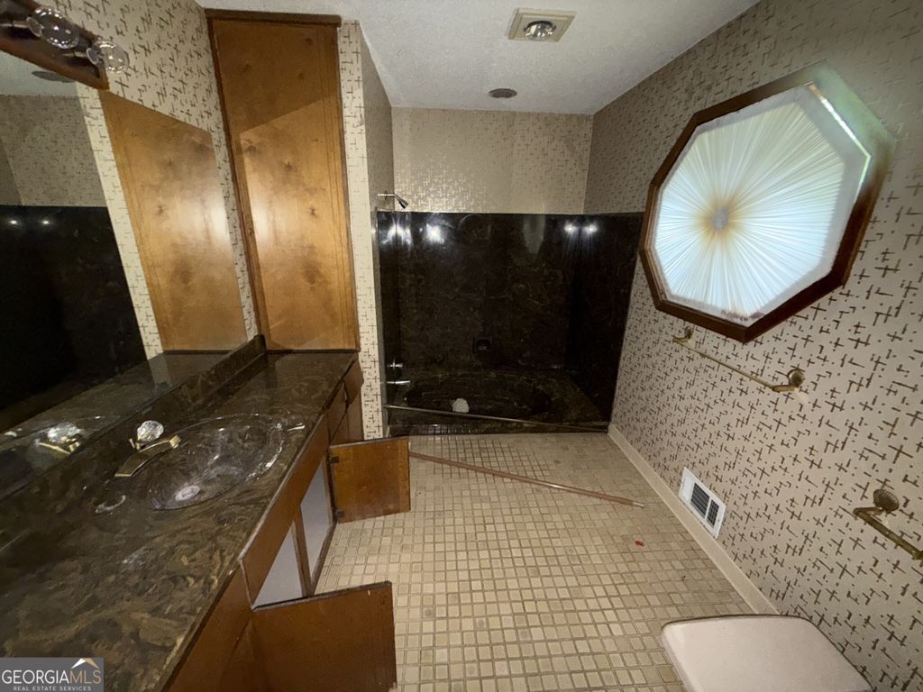 Photo of 829 Post Road Way, Stone Mountain, GA 30088 (MLS # 10766608)