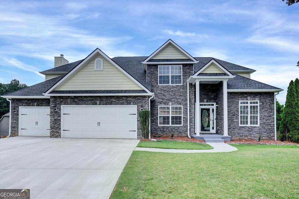 Picture-Perfect Living Awaits! Welcome to this stunning corner-lot home tucked away in a quiet cul-de-sac community, offering the perfect blend of space, comfort, and style. From its inviting curb appeal to its thoughtfully designed layout, this home is ready to impress. Step inside to find separate living and dining rooms, ideal for gatherings and celebrations. The spacious family room flows seamlessly into a chef-inspired gourmet kitchen featuring brand-new appliances, granite countertops, a large island, and a sunlit keeping room, perfect for entertaining. Upstairs, retreat to the generous master suite complete with a spa-like bathroom, double vanities, and two oversized walk-in closets. Three additional bedrooms offer plenty of room for family, guests, or a home office. The finished basement adds even more living space, boasting a huge family room, an additional bedroom, and a full bath. Outside, relax or entertain in your private, fenced backyard, flat and expansive, it's perfect for cookouts, playtime, or unwinding after a long day. This home truly has it all, spacious design, modern upgrades, and a welcoming community. Don't miss your chance to make it yours!