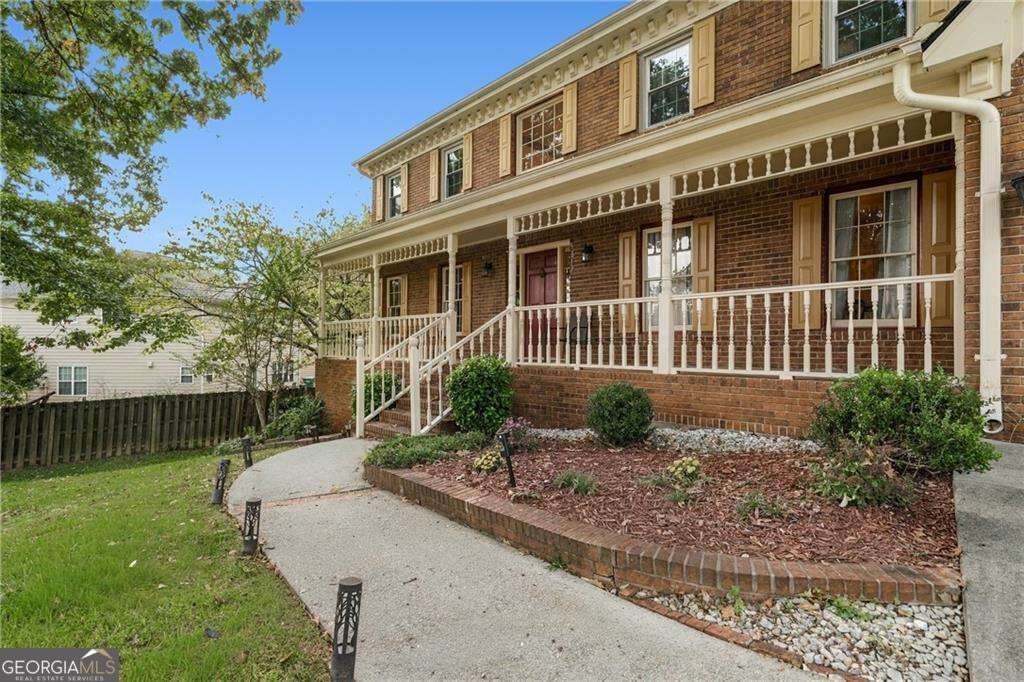 Photo of 5817 Lost Grove Drive NW, Lilburn, GA 30047 (MLS # 10882027)