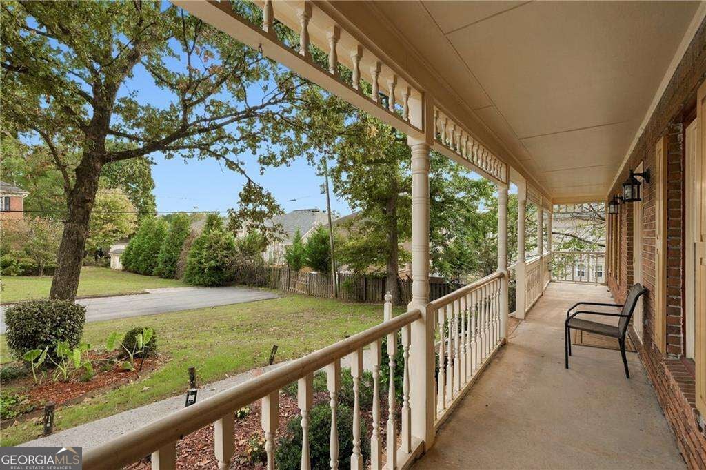 Photo of 5817 Lost Grove Drive NW, Lilburn, GA 30047 (MLS # 10882027)