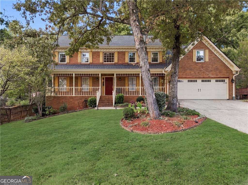 Photo of 5817 Lost Grove Drive NW, Lilburn, GA 30047 (MLS # 10882027)