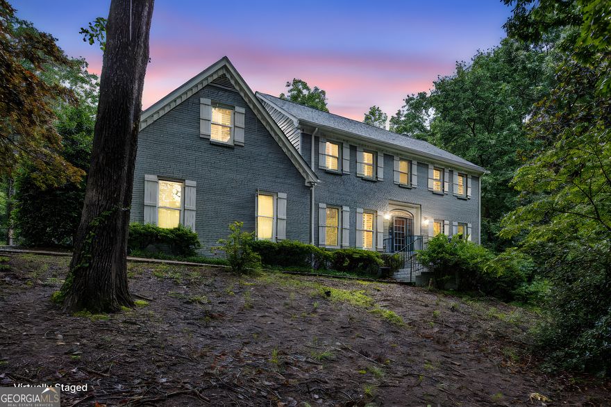 Absolutely Stunning Home in Desirable Linkwood Community of Johns Creek!  Welcome to 386 Link Road, where elegance meets comfort in this beautifully upgraded  residence nestled in one of Johns Creek's most sought-after neighborhoods. From the moment you step into the grand two-story foyer, you'll be captivated by the attention to detail, custom crown molding, and thoughtfully designed architectural niches throughout.  Entertain with ease in the formal living and dining rooms, or relax in the spacious, open- concept kitchen featuring a massive stainless steel refrigerator, gas cooktop, double ovens, pantry, and exquisite cabinetry. The adjoining breakfast area leads to a screened-in porch, offering serene views of the private, wooded retreat-your perfect escape.  Upstairs, the owner's suite boasts a tray ceiling, luxurious en-suite bath, and a generously sized walk-in closet. Three additional bedrooms share a full bath, with rear staircase access conveniently located off the main-level laundry room.  The fully finished terrace level offers a second kitchen, family room, private office, and flexible space ideal for guests, an in-law suite, or a teen retreat.  Enjoy outdoor living on the brand-new deck overlooking the beautifully landscaped backyard. With all the bells and whistles, this move-in ready home offers the perfect blend of style, functionality, and location.  Don't miss your chance-this home won't last long!
