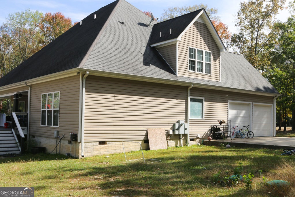 Photo of 325 Rain Valley Circle, Meansville, GA 30256 (MLS # 10881582)