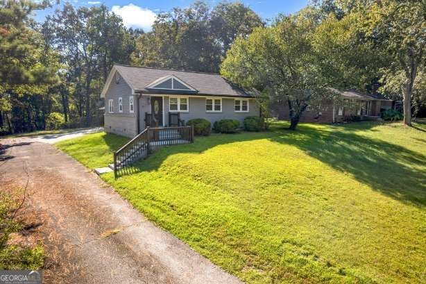 Photo of 2105 S Stone Mountain Lithonia Road, Lithonia, GA 30058 (MLS # 10877643)