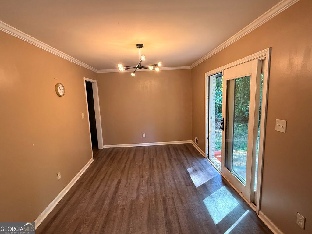 Photo of 5626 Noblett Road SW, Stone Mountain, GA 30087 (MLS # 10741953)