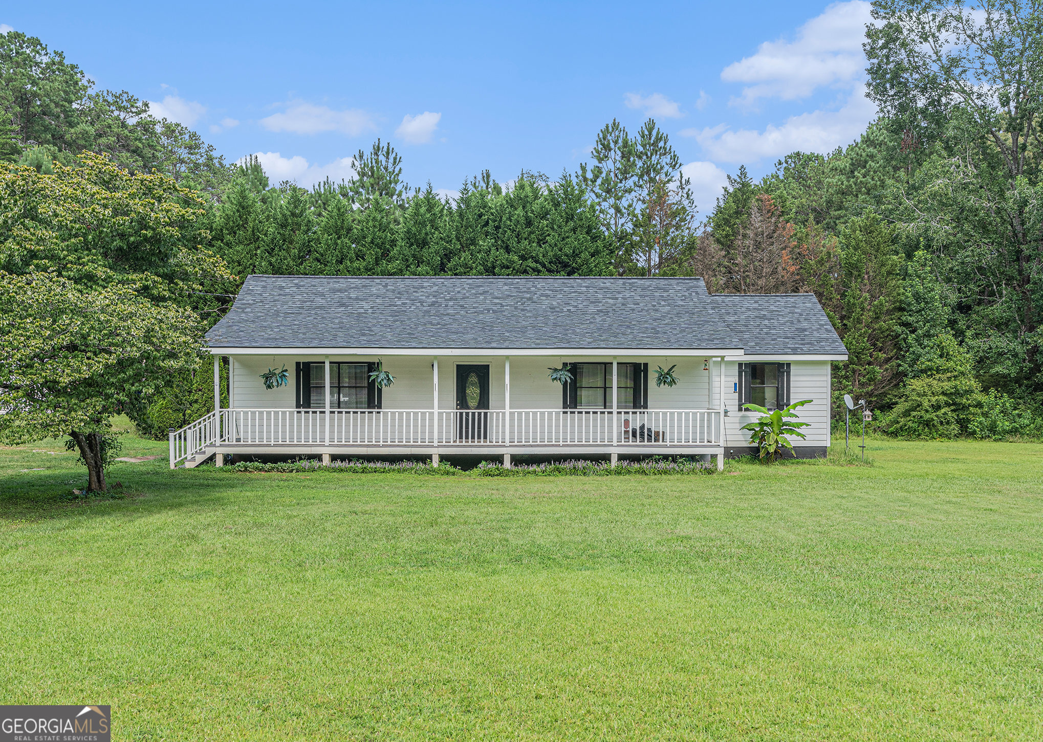 Charming Renovated 3-Bedroom Ranch on 1.73 Acres with Workshop! Welcome to your dream home! This beautifully renovated 3-bedroom, 2 full bath ranch sits on a spacious and level 1.73-acre lot, offering the perfect blend of modern updates and peaceful country living. Step inside to discover a fully updated interior featuring new flooring, a stylishly remodeled kitchen, and renovated bathrooms-all completed within the last five years. Major systems have been upgraded as well, including a new roof, HVAC, electrical, and plumbing, giving you peace of mind for years to come. The septic tank has been recently serviced and is in great condition. Outside, you'll love relaxing on the large front porch or entertaining on the beautiful rear deck that overlooks the expansive property-ready for a garden, outdoor projects, or simply enjoying the space. A standout feature is the oversized workshop, fully equipped with both electricity and water-ideal for hobbies, storage, or business use. This move-in-ready home is the perfect balance of comfort, functionality, and outdoor space-ready for your next chapter.