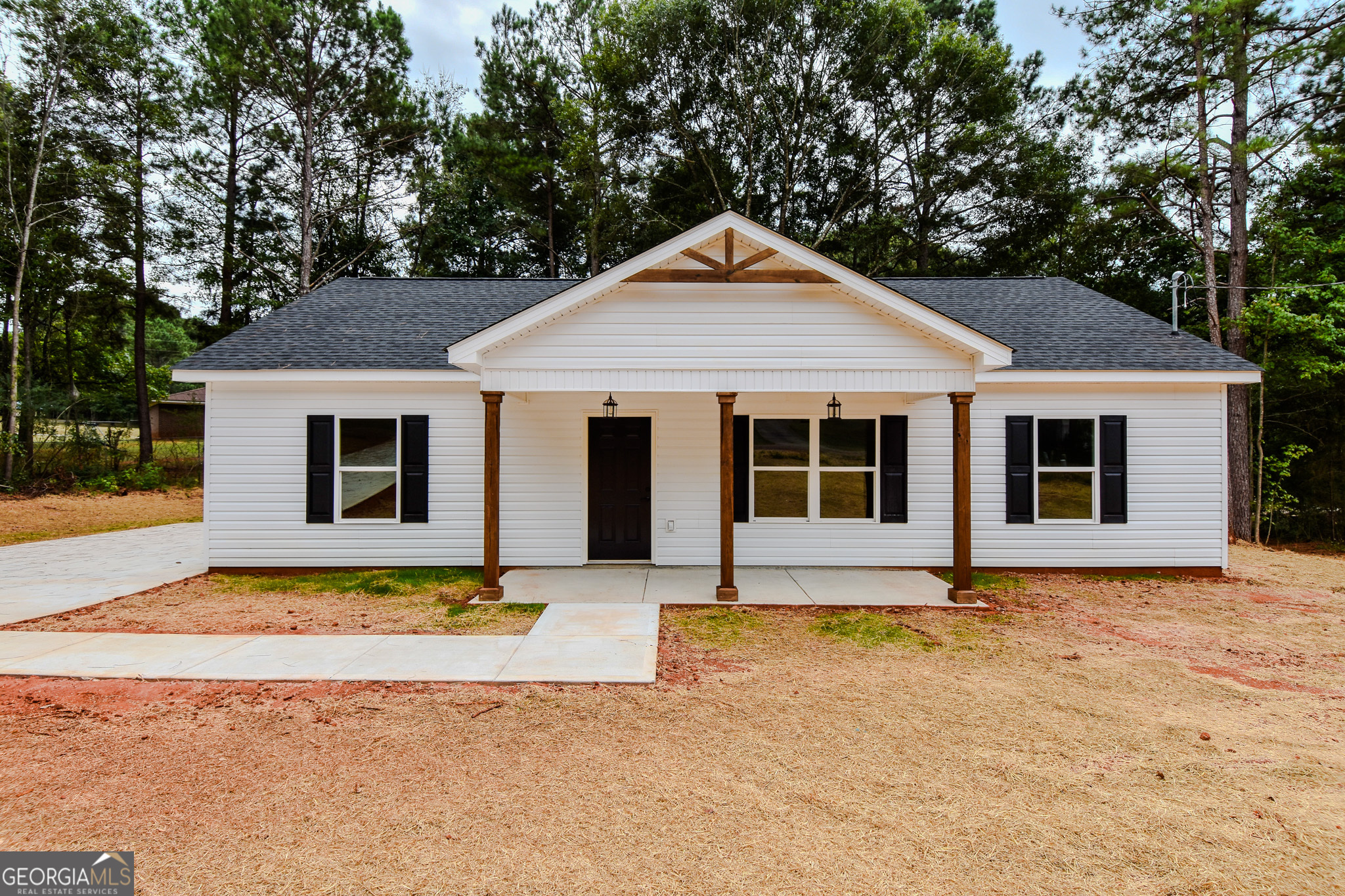 Welcome to this stunning new construction ranch-style home that perfectly blends modern convenience with classic charm! Boasting three spacious bedrooms and two beautifully appointed bathrooms, this open floor plan is designed for both comfort and style. Step inside and be greeted by a bright and airy layout that seamlessly connects the living, dining, and kitchen areas-ideal for entertaining family and friends or enjoying cozy nights in. The heart of the home features gorgeous granite countertops throughout, adding a touch of elegance and durability to your culinary adventures. Retreat to the private split bedroom plan, where you'll discover a luxurious primary suite complete with double vanities and generous walk-in closets, providing ample storage and a serene escape. The additional bedrooms are equally impressive, perfect for guests, kids, or a home office. You'll love the convenience of a dedicated laundry room, making chores a breeze! Situated on a level lot, this home offers a blank canvas for your outdoor oasis-imagine the possibilities! Don't miss out on this fabulous opportunity to make this beauty your own! Schedule your tour today and experience the perfect blend of modern living and thoughtful design!