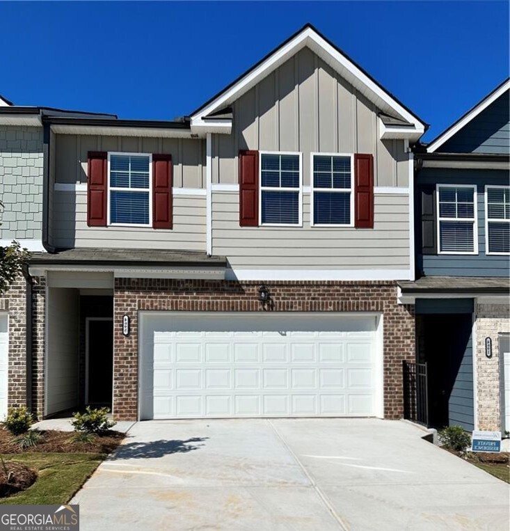 Luxury townhome in Oakwood available, minutes to downtown Gainesville, University of North Georgia - Gainesville campus, Lake Lanier Marinas and I-985. Newer townhouse, just two years old - and still feels like new. Bright open concept floor plan with plenty of upgrades throughout. Kitchen has granite countertops, stainless steel appliances, subway tile backsplash, and tall white cabinets, overlooking the living areas. Half bath and a two-car garage completes the main level. Spacious primary suite with trey ceilings and an oversized primary bath with double vanities and a huge walk-in closet. Two additional large bedrooms with an additional full bath. Available starting July 15, 2025!