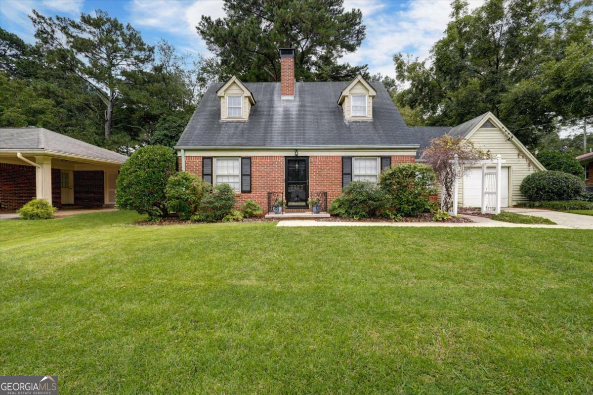 Enjoy life in the heart of Decatur with this charming 3-bedroom, 2-bath brick home. The kitchen is fully updated with quartz countertops, stainless steel appliances (including a refrigerator), a gas cooktop, and a walk-in pantry. Enjoy the built-in desk in the kitchen, perfect for working from home. Throughout both levels, you'll find hardwood floors and fresh paint, adding to its warm and welcoming feel. The flexible floor plan offers options for a primary suite on the main level or a convenient roommate-style setup, with a full bath on each floor. Decorative fireplace in the living room. Covered carport with a garage door will fit one vehicle. Situated just minutes from Decatur's shops, restaurants, and entertainment, and with easy access to I-285, this home makes both daily living and commuting a breeze.