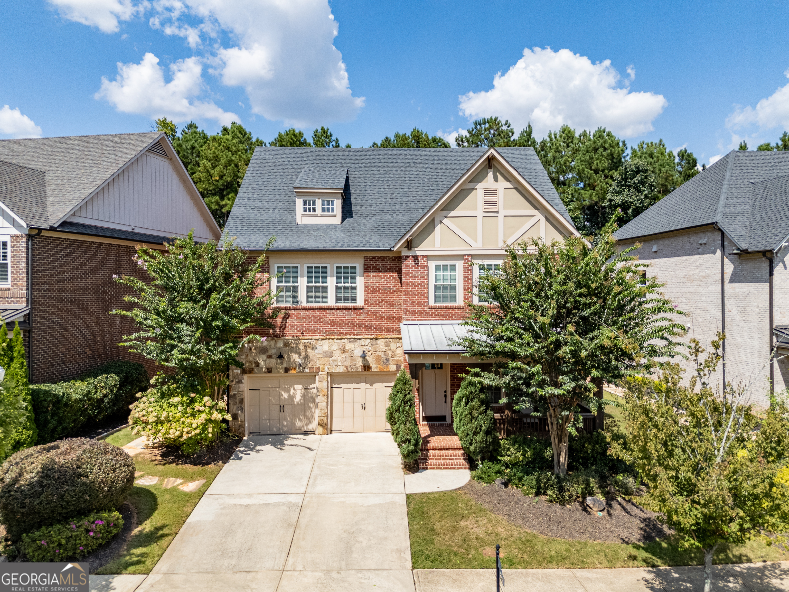 A gated swim/ tennis community. Luxury House with Kitchen Aid SS appliances in highly desirable Alpharetta area. Minutes from GA. 400, Avalon and top rated schools. 10 FT ceiling on first floor and Open plan with modern Kitchen face to Family room with cozy fireplace. Four large bedrooms and 3 bathrooms on 2nd floor. Fresh Interior paint, Fenced backyard. Great location! Move in ready!