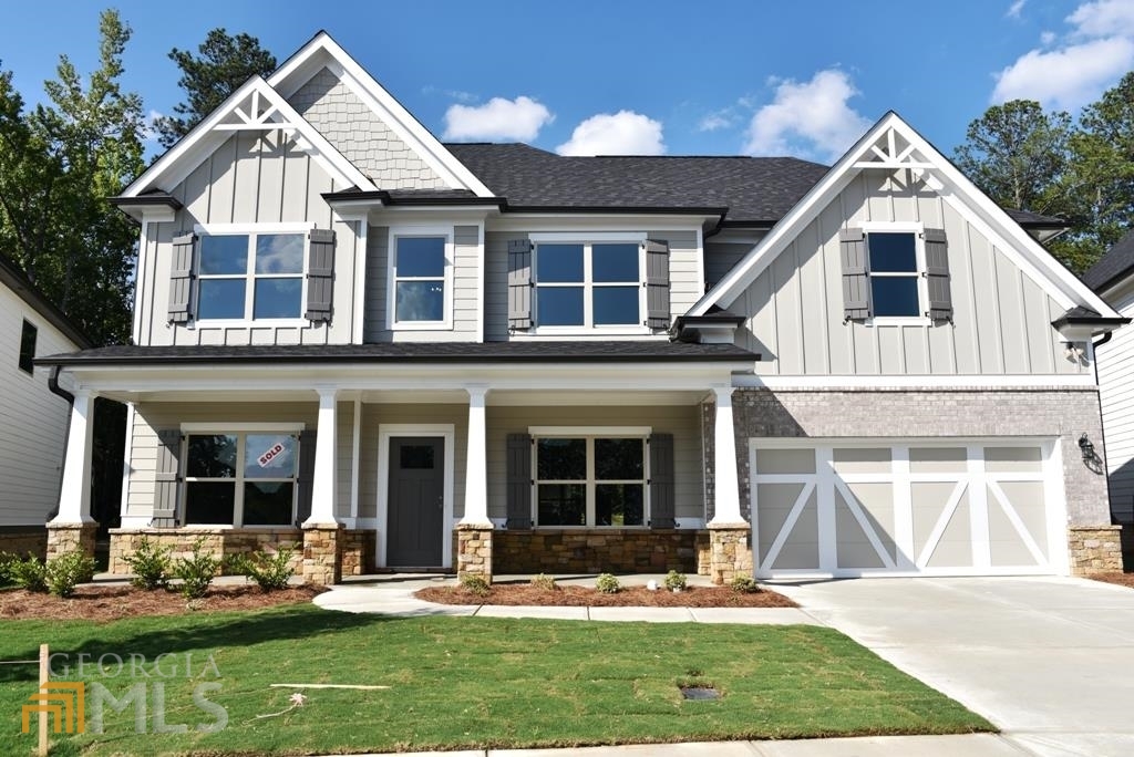 Beautiful new construction homes in Grayson, built around Dove Lake, Craftsman style homes,4 sided stone and brick watertable, board and batten elevation, 9 1/2 foot kitchen island with double sink & water, stainless steel appliances, 42" cabinets, luxury plank vinyl in kitchen and breakfest area, secondary bathrooms, laundry room and foyer, tile kitchen backsplash, stainless steel hood vent. Kitchen is open to family room, master bath has tile floor, separate tub with tile surround and tile shower. Master bedroom has large closet.Partially covered back patio with wood burning fireplace. Front elevation is stone water table, 3 sides are brick water table.