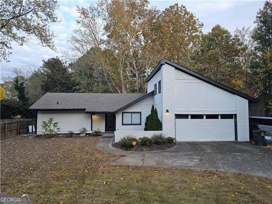 Enjoy living in this nicely renovated 4 bed and 2 bath home located in prime Marietta area in a very sought after school district. The home features three nice size bedrooms, separate family room with fireplace, 2 car garage, nice tall ceilings, nice size back patio, separate dining room, very good size front and a fenced backyard. The kitchen is tastefully remodeled and features custom white cabinets, stainless steel appliances, and dining room offers nice seating capacity. The bathrooms are also nicely upgraded and master bath offers dual vanity sinks, a walk in closet, and separate shower. On the upper level there is a bedroom/bonus room. Won't last long!