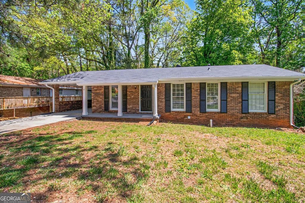 Photo of 835 Pine Roc Drive, Stone Mountain, GA 30083 (MLS # 10731221)
