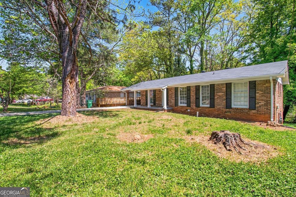 Photo of 835 Pine Roc Drive, Stone Mountain, GA 30083 (MLS # 10731221)