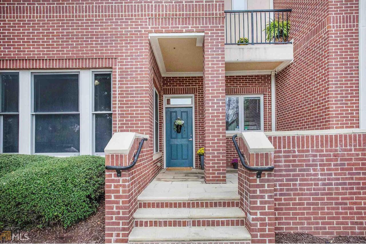 Fabulous Brick Townhome in the Lindbergh/Buckhead area - within walking distance to COUNTLESS restaurants & shops * Airy kitchen features granite countertops w/ready access to dining & family areas * Open floor plan offers great entertaining potential & space versatility - including room for a cozy reading nook or office * Loads of natural light throughout * All bathrooms w/granite countertops & tile flooring * Lustrous hardwoods throughout the 1st & 2nd levels * Spacious master bedroom features park-view * Separate bed & bath on 1st level - ideal for teen/in-law suite * Access to outdoor areas on all 3 levels - including a rooftop patio w/view of Midtown skyline * Private 2-car garage * Fresh paint in guest bedrooms & kitchen area * Quick access to dog-park & the PATH400 Greenway Trl * Also close to MARTA, I-85, 400, Lenox Mall, & Phipps Plaza