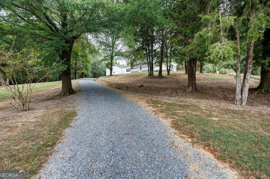 Photo of 960 Mcentyre Loop SE, Calhoun, GA 30701 (MLS # 10787575)