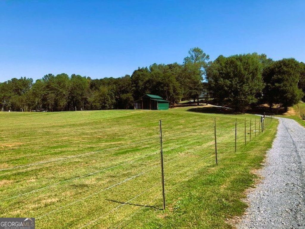 Photo of 960 Mcentyre Loop SE, Calhoun, GA 30701 (MLS # 10787575)