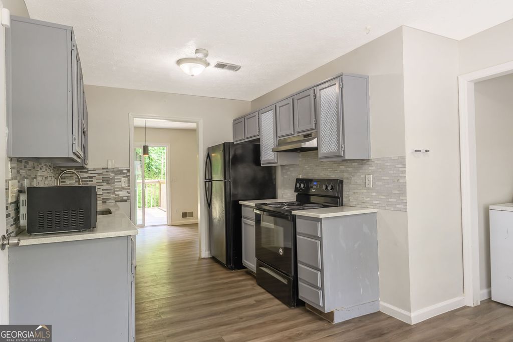 Photo of 2100 Whitebluff Way NE, Buford, GA 30519 (MLS # 10785382)