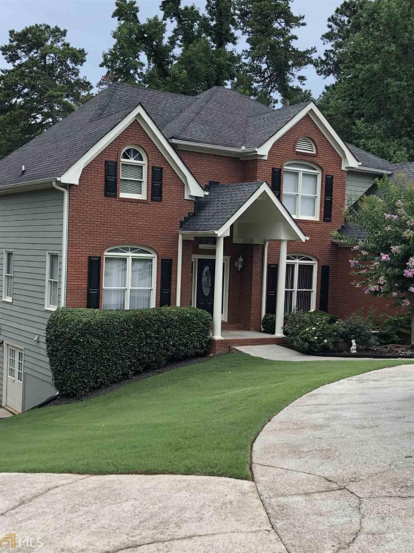 Seller says SELL! Amazing Brickton Station resale! Hardwood foyer gives way to 2 story fireside great room. Spacious dining room seats 12 and is just off the stylish kitchen. Kitchen has granite counters and overlooks the great room, breakfast room and is steps away from the screened porch. Master on main with deep trey and large master bath with corner jacuzzi tub. Upstairs are 3 large bedroom and 2 roomy baths. Basement is finished with a media room, bedroom and another bath. Basement has counter with sink and all appliance outlets to easily make a kitchen Double decks on the back and screened porch overlook a very private yard. Seller is motivated and has a house under contract. $10,000 available in seller concessions also!