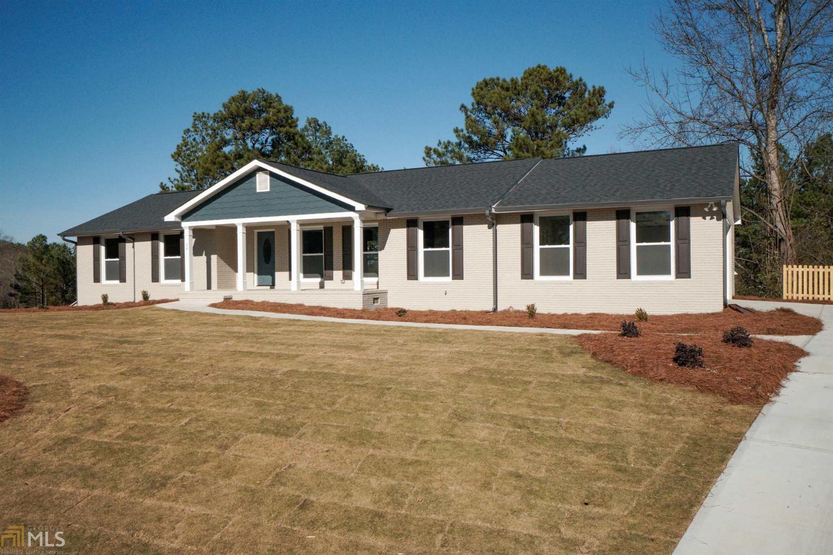 WOW! COMPLETELY REMODELED 4 SIDED BRICK HOME WITH FULL BASEMENT ON 1 ACRE--AT A GREAT PRICE! Convenient location to Gwinnett county, Hwy 124, Hamilton Mill, and 316. Must see this beautiful ranch offering 3 bedrooms, 2 baths, large family room, formal dining! Large Kitchen with granite counters and eat-In breakfast area. Fresh paint. NEW--Roof, Windows, HVAC, Plumbing, Electrical, Appliances, Flooring, Cabinets, Countertops. Basement stubbed for bath. Call today! Year built is approximate. Septic Layout shows install in 1984. Seller has not occupied the property.