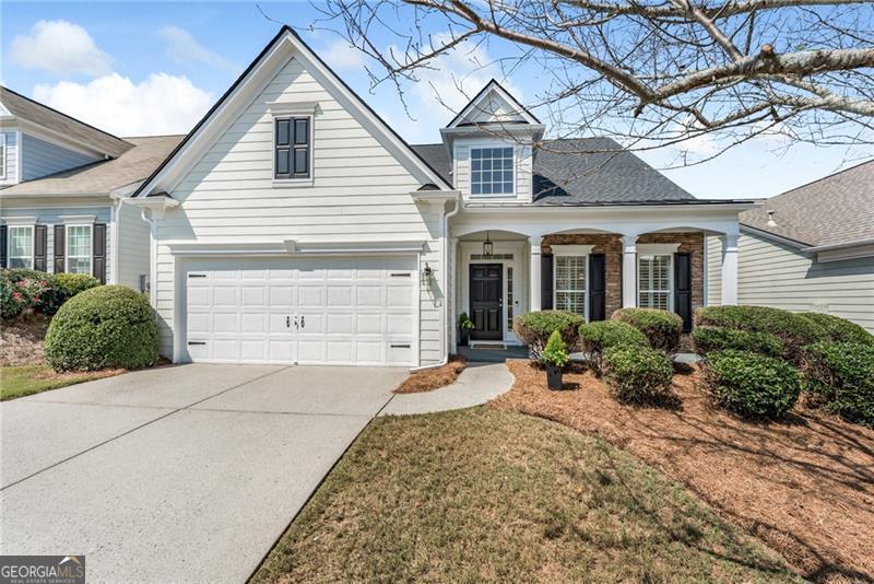 Elegantly Updated Home with Superb Craftsmanship and Attention to Details. From the BRAND NEW ROOF to the highly durable LVP flooring, this property exudes QUALITY and COMFORT from top to bottom! Situated on a LEVEL lot near the cul-de-sac, everything is EASY and PEACEFUL at 1555 Diplomat Drive. Warm, neutral tones on the walls and flooring allow the custom cabinetry in the kitchen and bathrooms to subtly pop, creating WOW FACTORS that will not go unnoticed. To boot, there's lots of extra icing on this cake: QUARTZ counters, soft closing drawers and doors and ceiling height cabinets in the kitchen...all of which effortlessly enhance the beauty and functionality of this exceptional home. CUSTOM millwork and a double tiered chandelier in the two story living room gracefully elevate the look and feel of the central gathering space. Glass sliders provide easy access to the delightfully ENCLOSED porch that overlooks LUSH emerald grass and evergreens in the spacious backyard. The light-filled primary suite features a tray ceiling, gorgeous chandelier, plantation shutters and an all new LUXURY bathroom. Delight in the custom, oversized shower with FRAMELESS glass surround, designer tile, modern double vanity with high end lighting and mirrors, plus a water closet and a large walk-in closet. A second bedroom and full bathroom on the main level can also serve as an office or convenient flex space. The generously proportioned upper level is designed for multi-functional purposes: with a large bedroom, updated full bathroom and a gigantic loft space, it can serve as a guest suite, entertainment space, office space or anything you can envision. Peachtree Court residents enjoy the benefits of YARD MAINTENANCE, year-round social activities at the clubhouse, a pool and community greenspace. With its central location, it's mere minutes to: GA 400, The Collection, restaurants, retail, medical, Halcyon, Lake Lanier and more. ABSOLUTELY THE MOST BANG FOR THE BUCK in South Forsyth County. Come make it yours today.