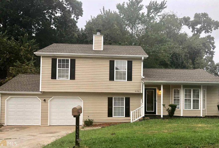 Move in Ready!!! This perfectly sized three bedroom, two full bath split level home features a new roof, beautiful engineered hardwood floors on main, new stainless steel appliances, fresh paint throughout, and an oversized backyard. You will enjoy a quiet evening at home by the fireplace in your downstairs den or a night of entertaining in your huge backyard. Come and see today. This is not a flip and you will not be disappointed!!!