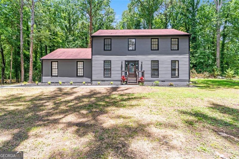 This won't last. Newly renovated 4 bedroom 2.5 bath home in the highly saught after Princeton Chase neighborhood. The home sits on a large, level lot that's just under an acre in size, perfect for gatherings and family cookouts. The interior and exterior has been newly painted. Granite countertops throughout kitchen and baths. New luxury vinyl plank flooring in natural hardwood color. Fresh landscaping accents the warm exterior color of the home. Upgraded staircase with newly installed rod iron railing. Lighting recently installed to further modernize the look of the home. New airconditioners. Newer cabinets installed in kitchen and bathroom. This home is a close drive to Hartsfield-Jackson International airport and Trilith Studios.
