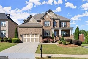 Over 5,500 square feet of luxury living in one of Alpharetta's most desirable neighborhoods. This 7 bedroom 5 bath home perfectly combines upscale finishes with everyday comfort, just minutes from Avalon, the Alpha Loop, and Downtown Alpharetta. At the heart of the main level is a chef's kitchen with rich cabinetry, premium appliances, and expansive counters, opening to a grand family room with soaring ceilings, custom built ins, and ceiling speakers - ideal for entertaining and relaxing. Step onto the luxurious covered porch overlooking the large backyard, perfect for morning coffee or evening gatherings. The primary suite is a private retreat with dual closets, a spa-like bath featuring a frameless glass shower, soaking tub, and dual vanities. Upstairs and main level HVAC system are newer and the basement HVAC/heat pump are less than a year old. The fully finished terrace level offers incredible flexibility with a secondary kitchen, generous living area, two bedrooms, a full bath, and space for a media room - perfect for guests, extended stays, or game-day hosting. Additional features include integrated ceiling speakers, high-end lighting, and a new roof (1 year old) with a 20 year warranty. Nestled in a peaceful enclave yet less than a mile from premier shopping, dining, and top-rated schools, this home offers unmatched convenience and style.