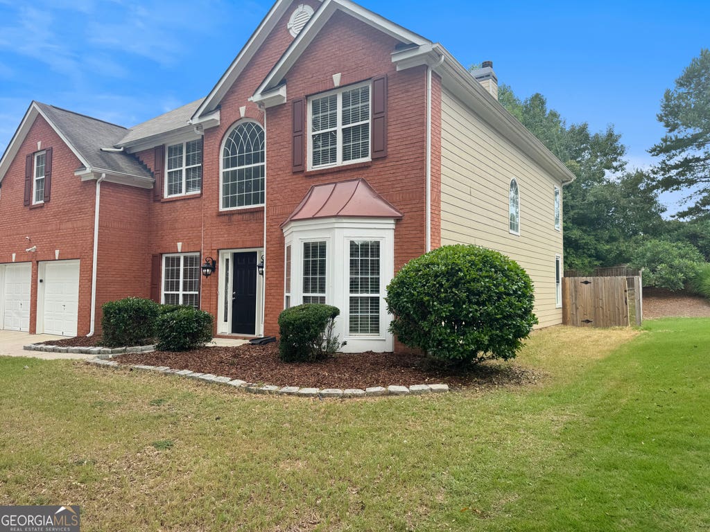 Photo of 400 Fitzgerald Place, South Fulton, GA 30349 (MLS # 10817482)
