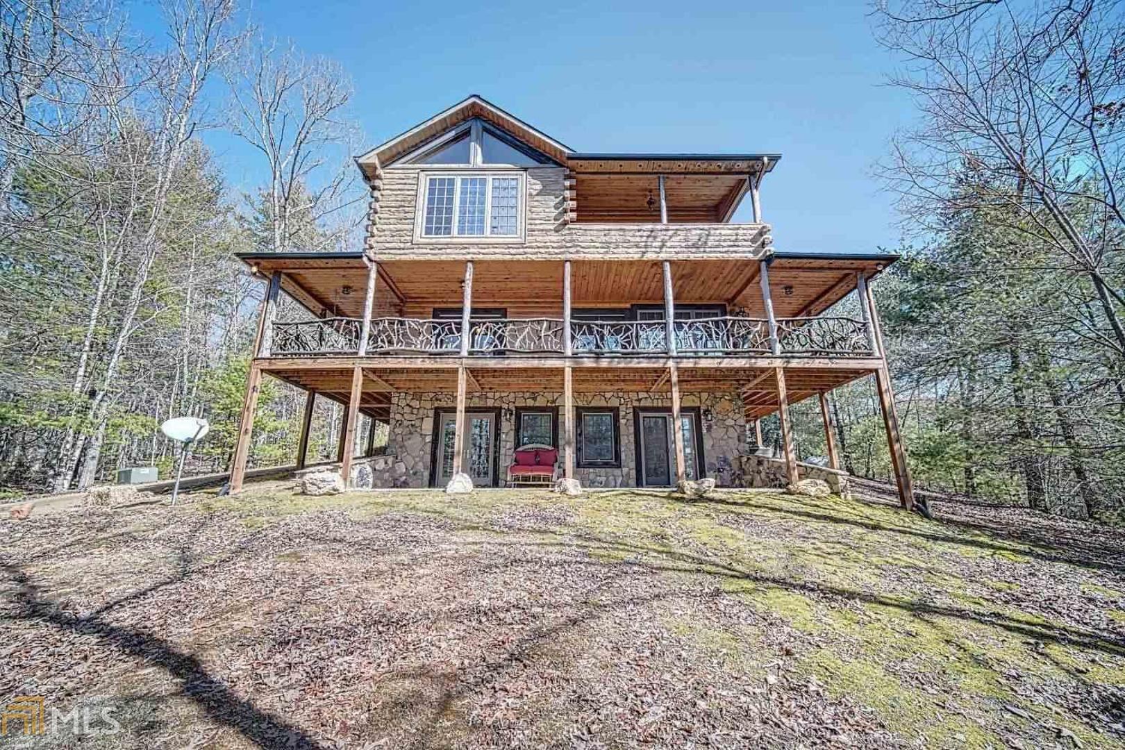 Beloved Custom Built Cabin in the Woods! 3/3 cabin with FINISHED Basement, authentic woods throughout, granite counters, open concept. Huge Fire Place in family room, Full wrap-around porch. Amazing VIEWS from Master walk out porch, unlimited potential for oversized loft! Master includes walk-in closet, Jacuzzi tub, separate shower. Lower level 3rd Bed & FB, Rec-Room. Desirable LOCATION Aska Adventure Area waterfalls, hiking trails, trout fishing, Blue Ridge Lake. The PERFECT getaway, great investment opportunity and/or DREAM home! Don't miss this one!!! Call or text agent with any questions. You will need gate code to get onto Mountain Lake Circle.