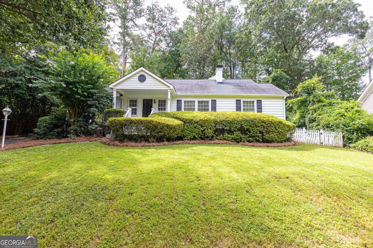 Charming traditional cottage charmer on .5 acres of seclusion. Rocking chair on front porch overlooks a private, park-like front yard. A small bkyd with side yard and deck allows comfort from landscaping for relaxation. Upon entering, you are greeted by the warmth and home atmosphere. Spacious red brick floor in kitchen and keeping room adds additional charm. Home offers large rooms with back stairs to loft area for entertaining or exercise area away from gyms. Coveted Pinehills neighborhood of North Buckhead/Brookhaven offers optional membership to Roxboro Valley Association swim/tennis located on the same street. Children Healthcare of Atlanta campus is located minutes away from location as well as quick commute to Hartsfield-Jackson Atlanta International Airport. Don't delay and miss this opportunity!