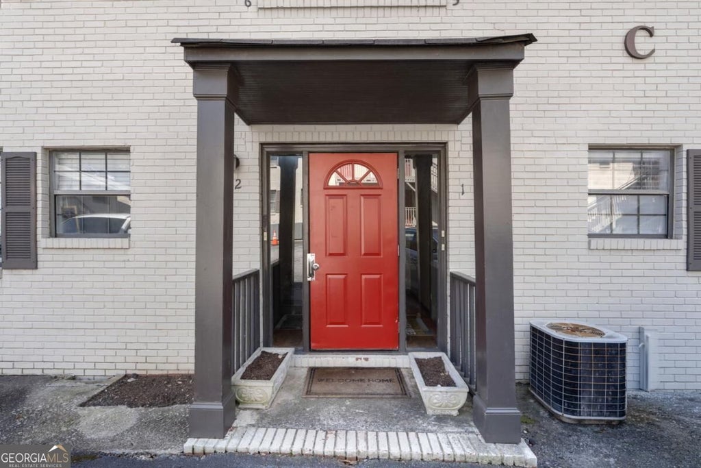Photo of 410 Candler Park Drive NE #C1, Atlanta, GA 30307 (MLS # 10857391)