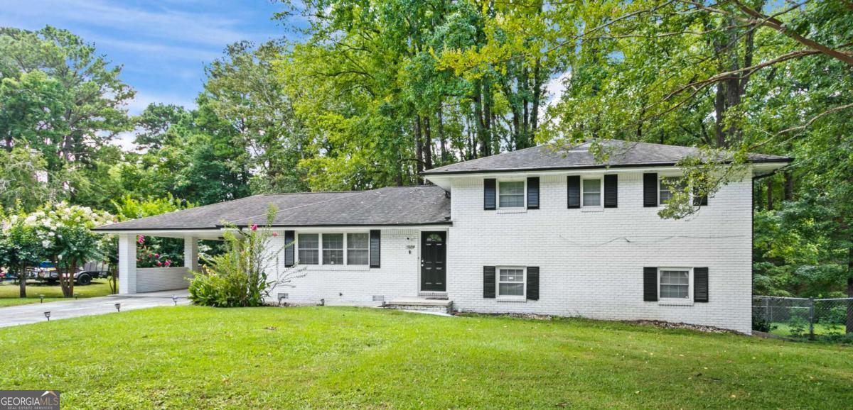 If you are looking to lease a property in the heart of East Atlanta, this is your opportunity! This spacious and recently renovated open-concept ranch offers 4 bedrooms and 2.5 bathrooms, including a private in-law suite with its own living area, bedroom, and full bath, perfect for guests, extended family, or a home office. Enjoy modern upgrades throughout, including stainless steel appliances, gleaming hardwood floors, and stylish finishes. The layout is ideal for both everyday living and entertaining. Step outside to a fully fenced backyard, perfect for pets, play, or relaxing outdoors. This house also features a long drivewary and carpot for parking convenience. Landlord is offering the option to be leased furnished or unfurnished, giving you the flexibility to move in with ease or bring your own personal touch. it is located on a prime area close to restaurants, parks, shopping and more. Don't miss out on this move-in-ready gem.