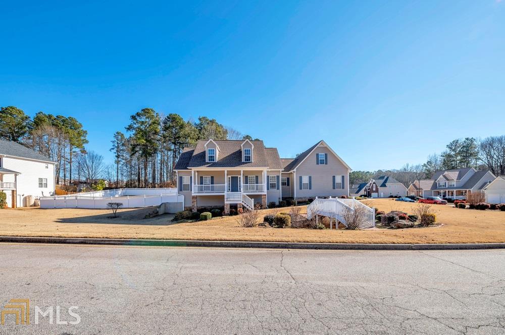 Don't miss this one in Paulding County! This gorgeous home features a brand new back deck, new A/C units, new water heater, upgraded counter tops and backslash in the kitchen, newer pet friendly carpet with upgraded padding, newer roof, full finished basement with a full bathroom, corner lot, freshly painted front porch, fenced in back yard, sodded front and back, bonus room and so much more. There is so much room for storage it is unbelievable. This home is nestled in sought after Barrington Chase Subdivision in Paulding County.