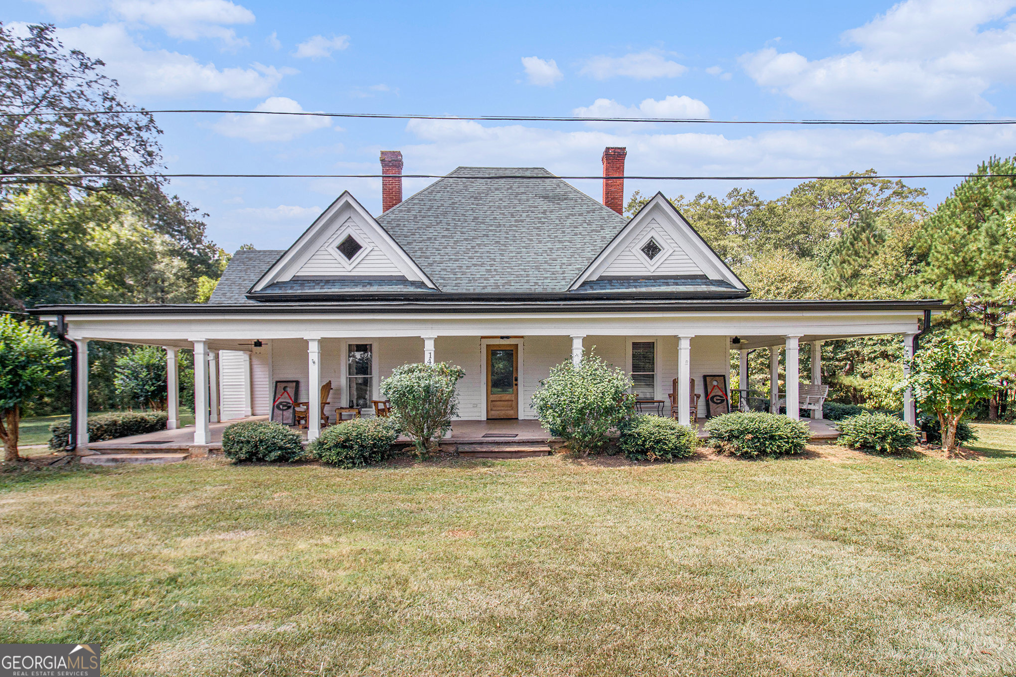 Step back in time with this remarkable historical home built in 1901, showcasing timeless character paired with thoughtful modern updates. Situated on 3.67 picturesque acres in Carrollton, this property offers a rare blend of history and convenience. Many original features remain intact, including fireplaces in both bedrooms, while the bathrooms have been beautifully renovated and the kitchen updated for today's lifestyle. Major systems have already been taken care of - the foundation, electrical, plumbing, roof and HVAC have all been completely redone, offering peace of mind for years to come. The attic has been framed, heated, and cooled, providing incredible potential for additional future living space. With wide porches, expansive grounds, and a seamless mix of old-world charm and modern comfort, this home is a true treasure waiting for its next chapter.