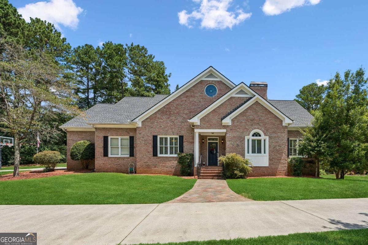 Welcome to your dream home! This stunning 4-sided brick estate offers resort style living just steps away from Archer High School. This home features a spacious floor plan with stained glass windows, plenty of natural light, and luxurious finishes throughout. The chef's kitchen boasts stainless steel appliances, butler's pantry, breakfast area and views of the backyard & pool. The primary suite is conveniently located on the main level for ease and privacy. There is an additional bedroom and full bathroom on the main level, fireside living room, formal dining room and laundry closet. Upstairs, you'll find two oversized teen suites, both with walk-in closets and separate bathrooms. There is also a loft area upstairs with a hidden laundry chute down to the main level. Entertaining family and friends is a breeze with the new saltwater pool and hot tub, perfect for summer parties or just working on your tan. In addition, the entertainer's basement is a showstopper, complete with a fireside great room, second kitchen, dining room, game room, office, second laundry room, bedroom and full bath. Plus, the basement has a separate entrance for easy access and privacy. The circular driveway takes total advantage of this corner lot with plenty of parking and a 3-car garage with extra workshop space. This home truly has it all! Located conveniently to beautiful parks, schools and easy access to 316 & Sugarloaf Parkway.