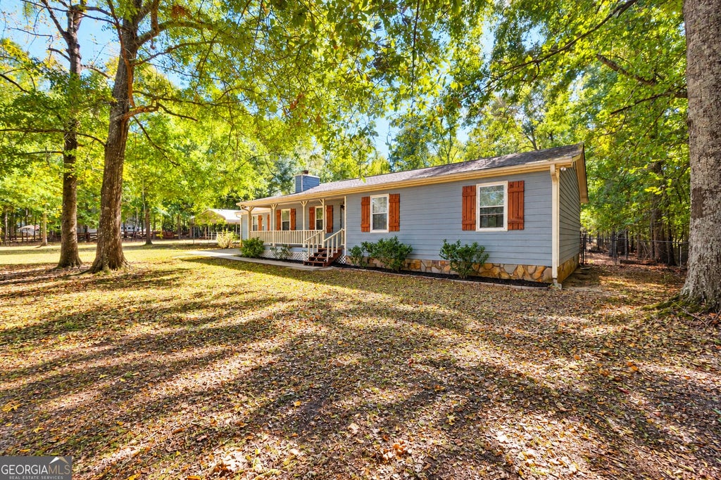 Photo of 370 Davis Road, Locust Grove, GA 30248 (MLS # 10880037)