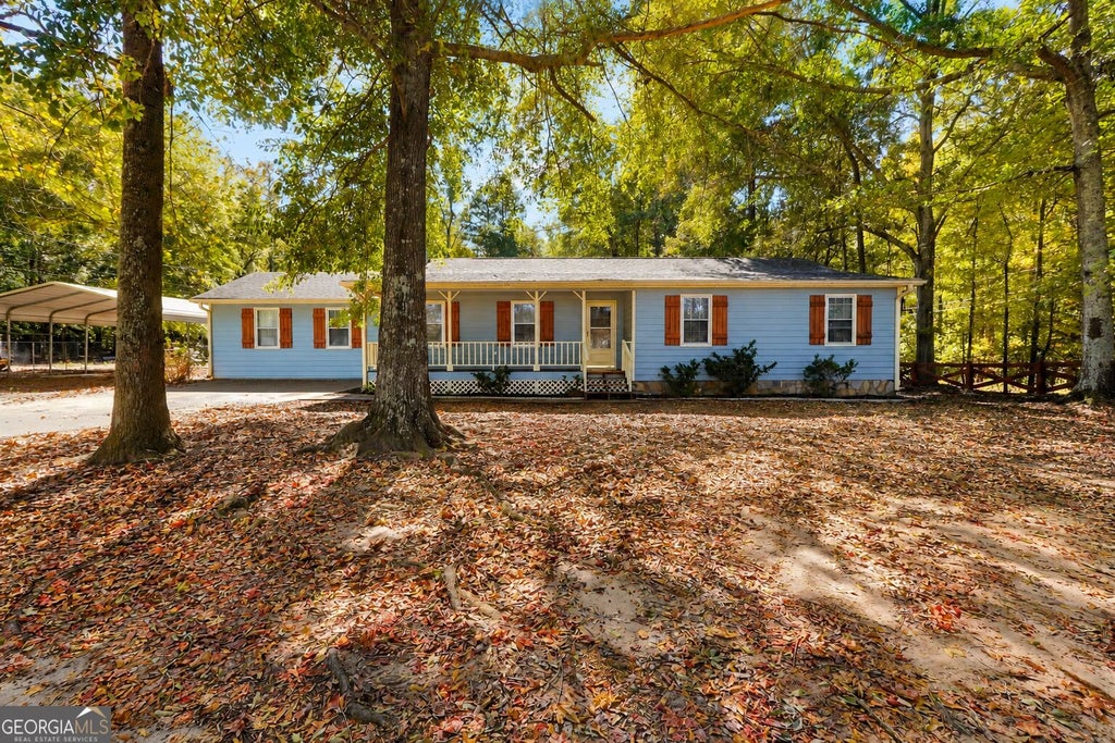 Photo of 370 Davis Road, Locust Grove, GA 30248 (MLS # 10880037)