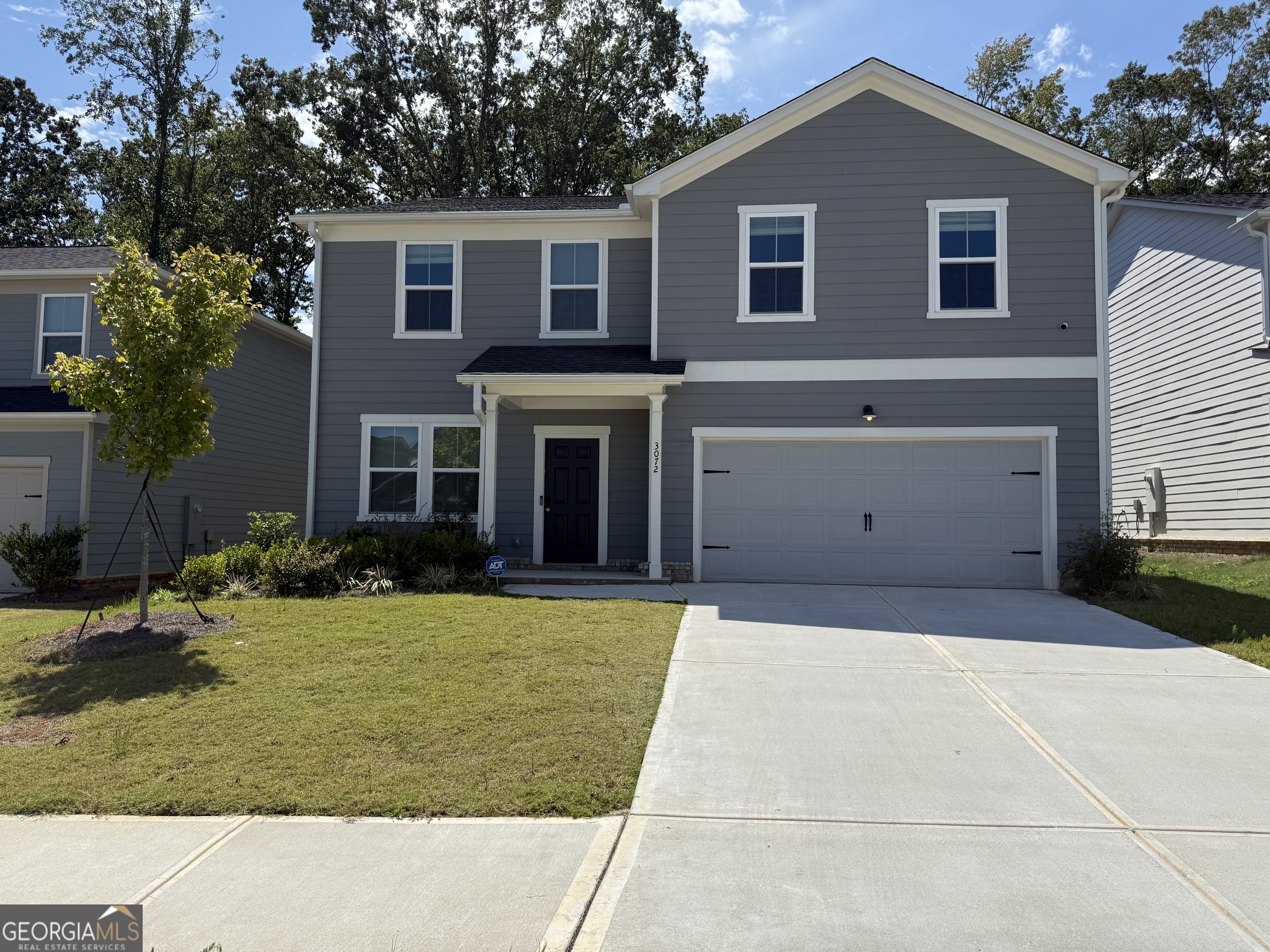 Welcome to 3072 Birdsong Avenue in Covington, GA! This spacious 5-bedroom, 3-bathroom home offers plenty of room for comfortable living and entertaining. The main level features an open-concept design with a bright family room that flows into a beautiful kitchen complete with ample counter space, stylish cabinetry, and a dining area perfect for gatherings. A guest bedroom and full bath on the main floor provide convenience and flexibility for visitors or a home office. Upstairs, the oversized owner's suite boasts a walk-in closet and a private bathroom with dual vanities, a soaking tub, and a separate shower. Three additional bedrooms and a full bathroom ensure space for everyone. Outside, the backyard is ideal for relaxing or entertaining, while the two-car garage adds practicality. The Westfield community offers a pool,cabana,playground, and pocket parks! Located in a desirable Covington community near shopping, dining, schools, and I-20, Historic downtown Covington, and the Mall of Stonecrest. Come view this gorgeous home today that combines comfort, functionality, and convenience. Don't miss this one in the highly sought after Westfield community.