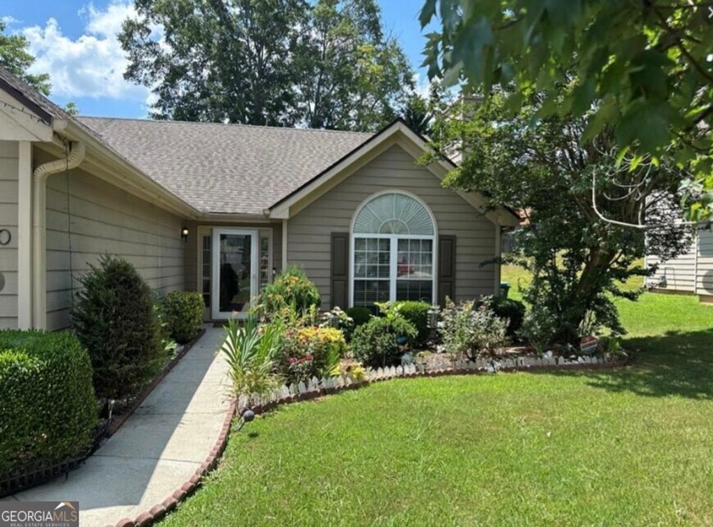 Photo of 4080 Landress Park Drive NW, Lilburn, GA 30047 (MLS # 10671094)