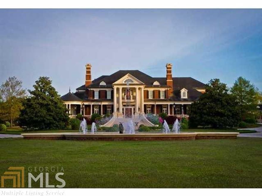 Spectacular gated custom estate on 14 acres with magnificent interior details. This home has a 14 car garage, separate pool house, 5 kitchens, 20 HVAC units, 3 laundry rooms, saltwater pool with outdoor fireplace, attic with custom cabinetry, elevator, service access driveway. House is electronically controlled. Custom built but owner never moved in. Every piece of woodwork is custom and each piece of stone carefully selected. Too many details to possibly describe - this is a masterpiece of construction. Underground tunnel connects detached garages with main house.