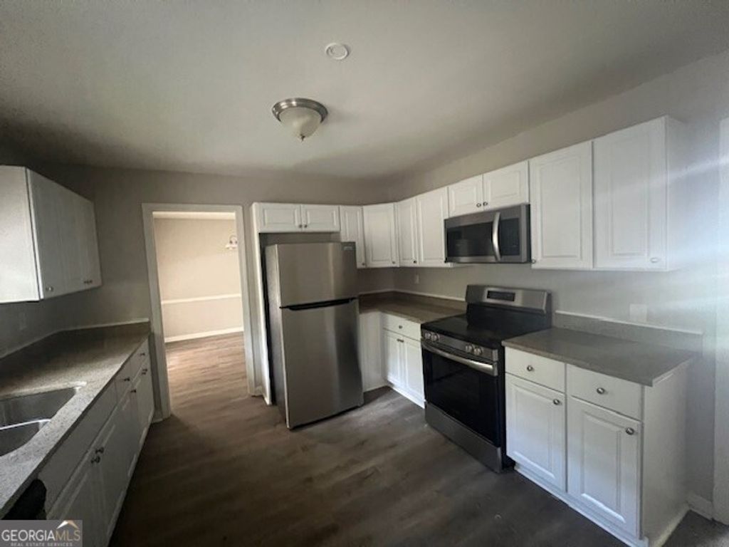 Photo of 401 Barbashela Drive, Stone Mountain, GA 30088 (MLS # 10631450)