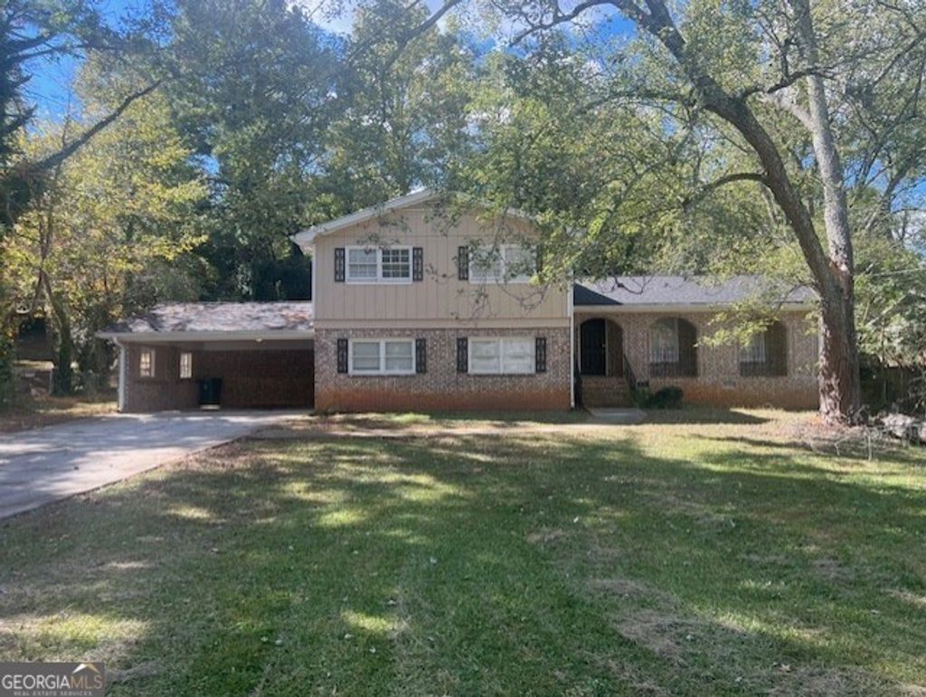 Photo of 401 Barbashela Drive, Stone Mountain, GA 30088 (MLS # 10631450)