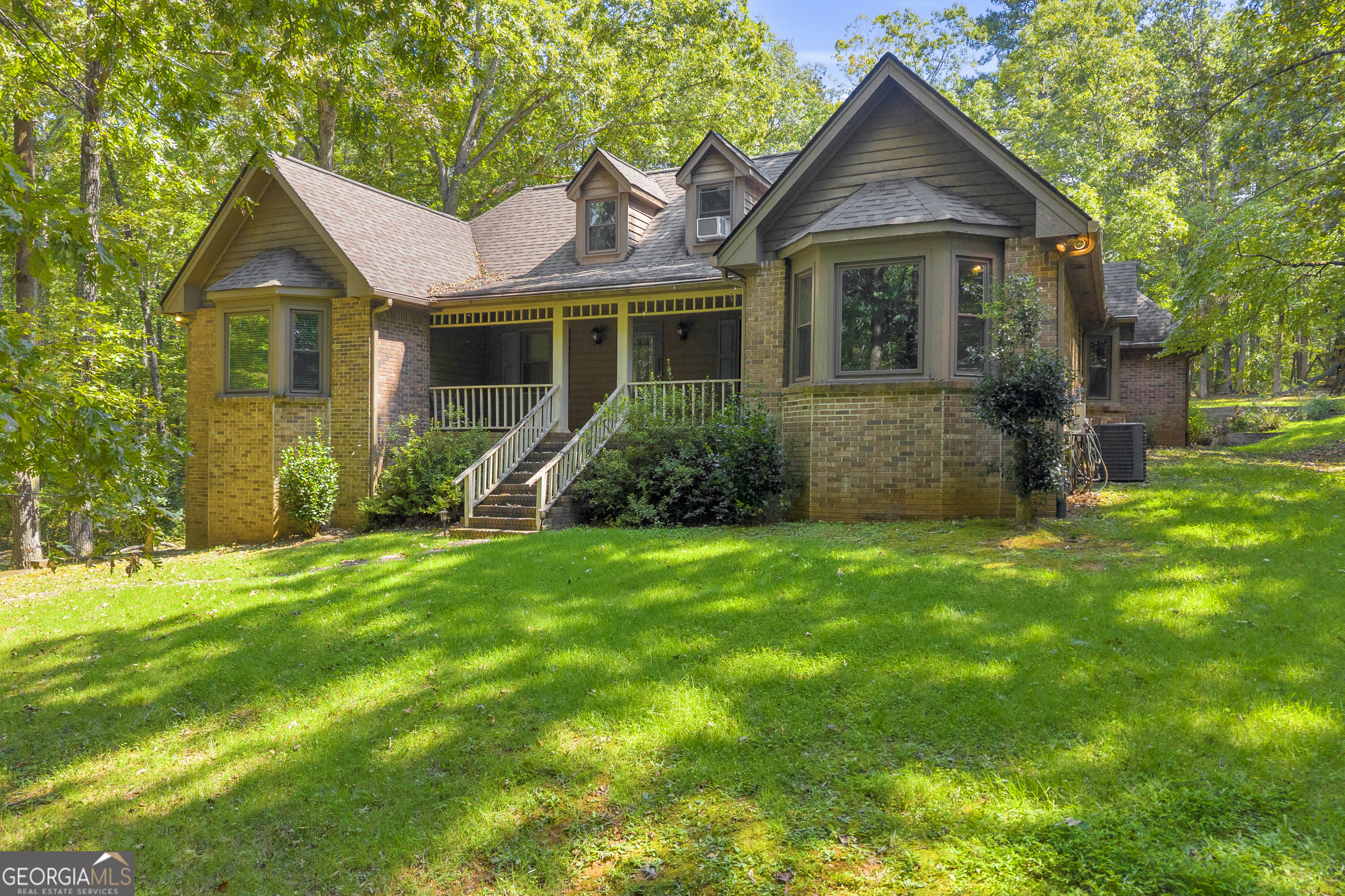 Welcome to this custom-built, one-owner home nestled on a serene 2.85-acre wooded lot. Offering privacy and natural beauty, this well-maintained property is all brick and it features 3 spacious bedrooms, 3.5 baths, and over 2,700 square feet of living space, plus a full unfinished basement for endless possibilities. Built in the 1980s with quality craftsmanship, this home has been lovingly cared for. The major components such as the roof, gutters, windows, and water heater have been replaced within the last eight years, ensuring peace of mind for its next owners. Inside, you'll find a solid foundation ready for your personal touch. Cosmetic updates will transform this home into a modern retreat. This home is situated on a beautiful lot, with an RV pad that has water and power. This property offers a rare combination: a prime location, solid construction, and the chance to create a home that reflects your style. Don't miss this outstanding opportunity to make it your own!