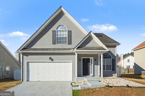 Photo of 1149 Quail Hunt Drive, Riverdale, GA 30296 (MLS # 10690638)