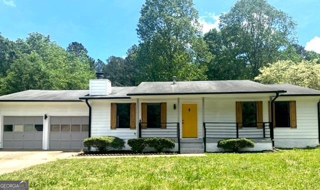 Upgraded 3-Bedroom, 2-Bath Home on a Spacious Level Lot Welcome to this move-in-ready home featuring a charming front porch, two-car garage, and hardwood floors throughout. Freshly painted interiors, new windows, and updated light fixtures give this home a bright, modern feel. The sunlit living room with a cozy fireplace opens seamlessly to the dining area, ideal for everyday living and entertaining. The updated kitchen boasts white cabinetry, new granite countertops, and a stylish backsplash and eat-in area. Sliding glass doors off the dining room lead to a large, level backyard-perfect for outdoor enjoyment. Quiet cul-de-sac, Conveniently located near I-75 & I-675. No Evictions | No Section 8 | No Smoking | Tenant responsible for all utilities & lawn maintenance All applications processed through RentSpree, All adults to submit application.